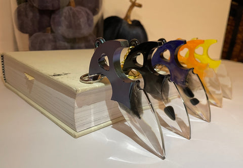 Push Dagger Keychains